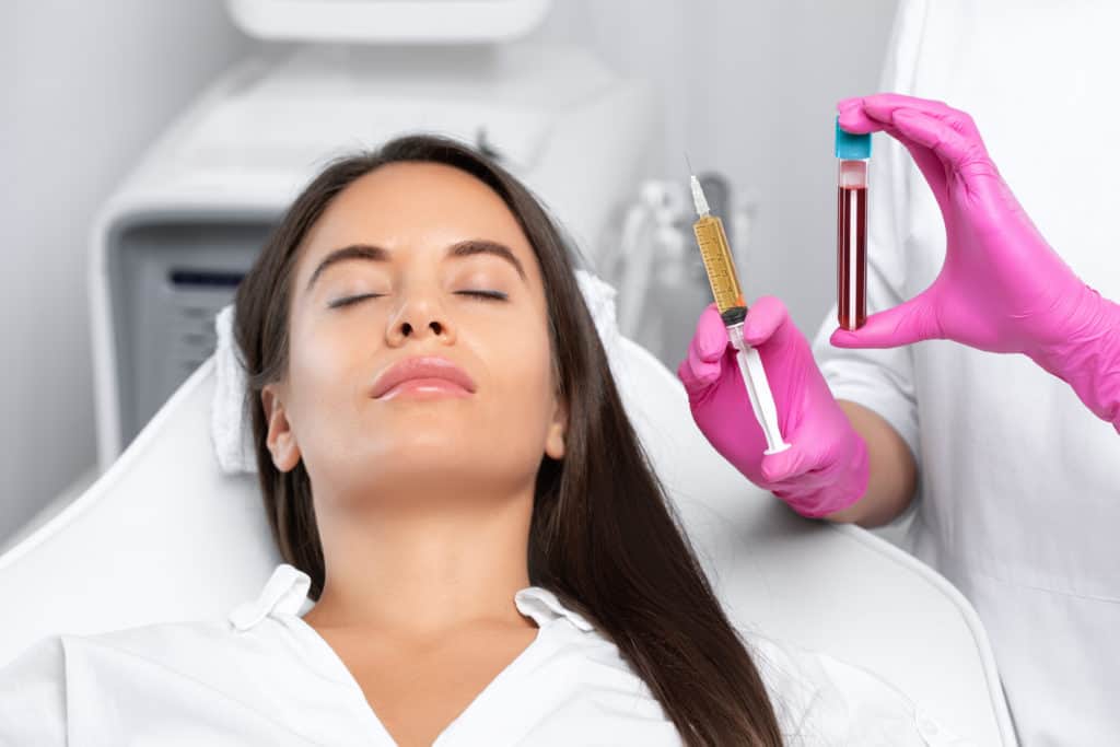 Beautician Holding PRP Injection Near Patient | Vibe Aesthetics in Hood River, OR
